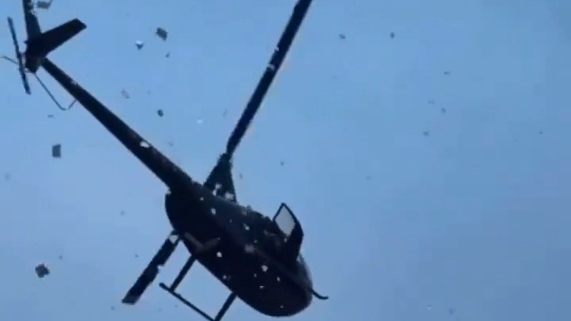 Lanzan miles de dólares desde un helicóptero en Detroit, Estados Unidos 